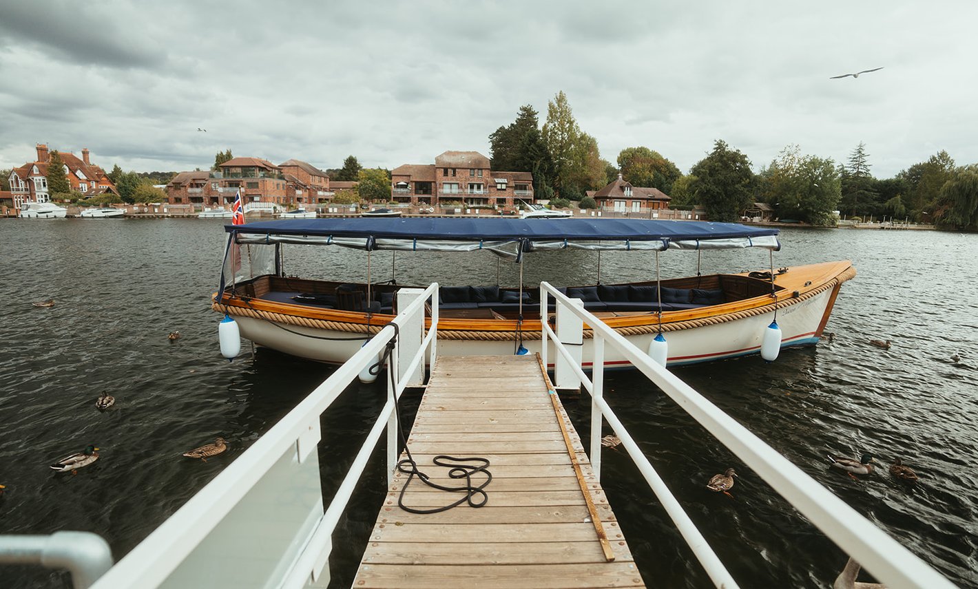 A jetty leading out to Queen of the Slipstream on the Thames at Marlow